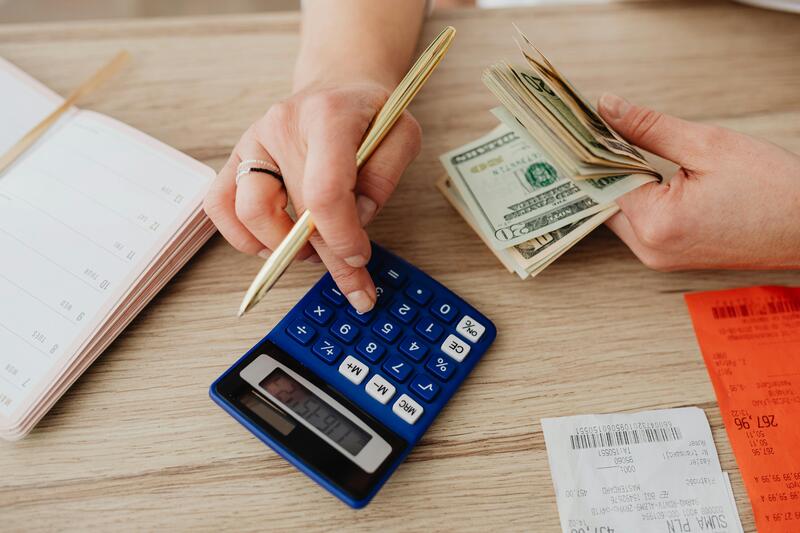 Calculator and receipts on a desk