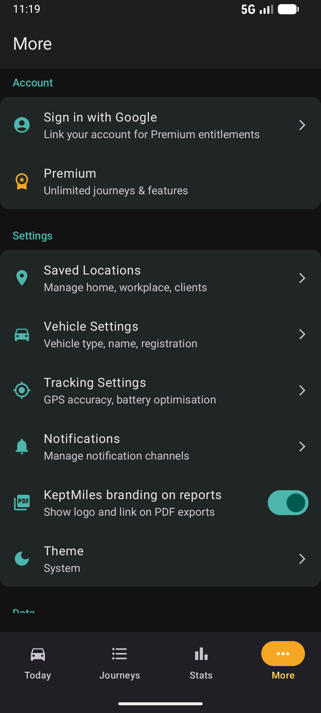 More settings screen in dark mode with Account, Settings, saved locations, vehicle settings, tracking, and theme